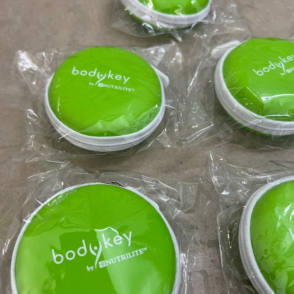 4 Green and White Earbuds with Case