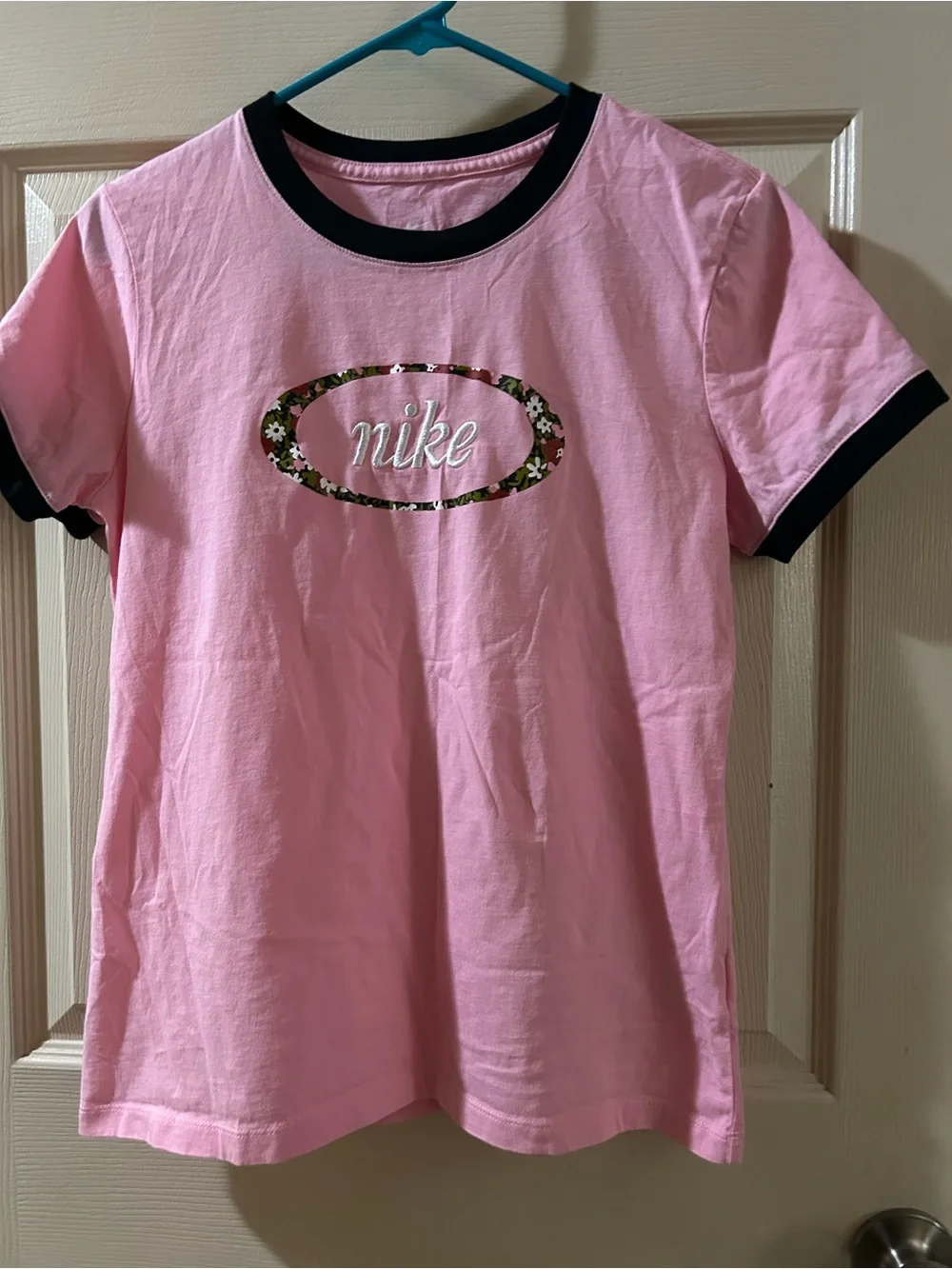 Nike Pink Ringer Tee with Floral Logo and Black Trim