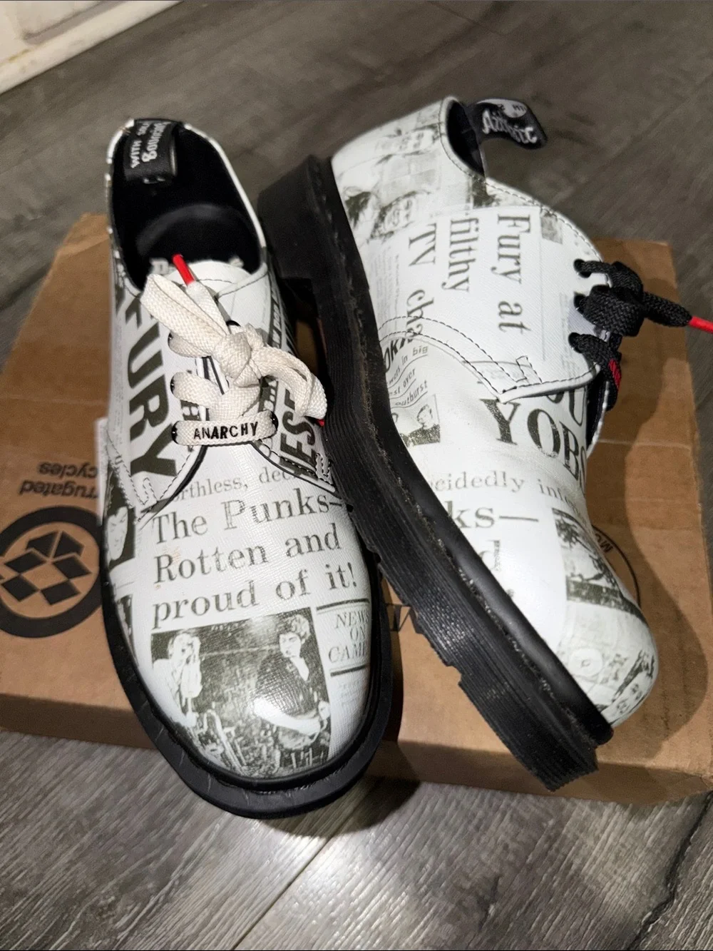 Dr. Martens 1461 Newspaper Print White & Black Oxford Shoes with Red Accents