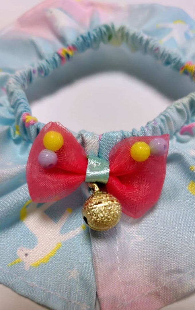 Handmade fabric collar with unicorn design, ribbon, and bell, large collar